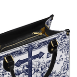 Catholight Ledertasche „Das Kreuz inmitten blühenden Glaubens“