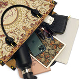 Catholight Ledertasche „Stärke in Anmut“