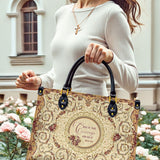 Catholight Ledertasche „Stärke in Anmut“