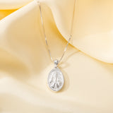 Katholische Halskette mit dem Heiligen Herzen Jesu und dem Kreuz als Schutzsymbol in Sterlingsilber 