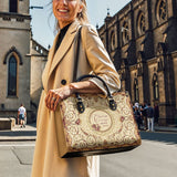 Catholight Ledertasche „Stärke in Anmut“