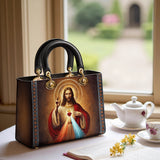 Catholight A Testament of Grace and Compassion Lady Leather Bag